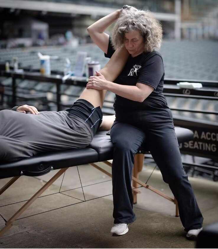 Athlete performing rehab exercises after sports injury